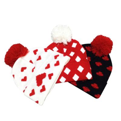 China COMMON Cheap Men Knit Pom Beanie Jacquard Custom Women Beanie with Pom Pom for sale