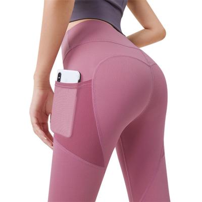 China Women's Breathable Stretch High Waist Yoga Pants With Mesh Pockets Exercise Running Yoga Tights for sale