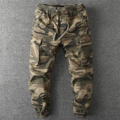 China Mid Waist Elastic Color Camouflage Anti-wrinkle Pants Sports Cowboy Tight Jeans Trousers For Men for sale