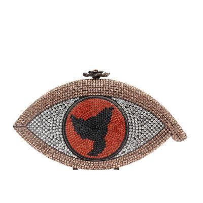 China Grace Lady Good Quality Daily Used Rhinestone Beaded Stone Crystal Clutch Bags Evil Eye Shape Woman Handbag Bling Metal Evening Purse for sale