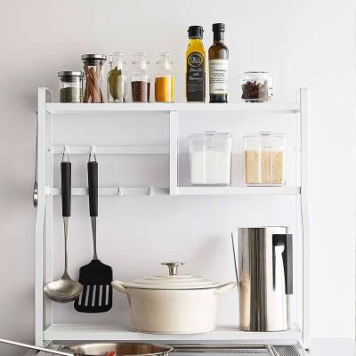 China Multifunctional Portable Countertop Shelving Storage Rack Seasoning Kitchen Shelves Suction Multilayer Perforated Cup Drain Storage Rack for sale