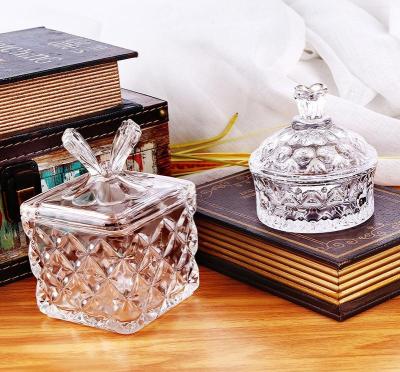 China Retro relief petal glass cover candy jar square butterfly storage ornament happy stocked candy jar coffee jar for sale