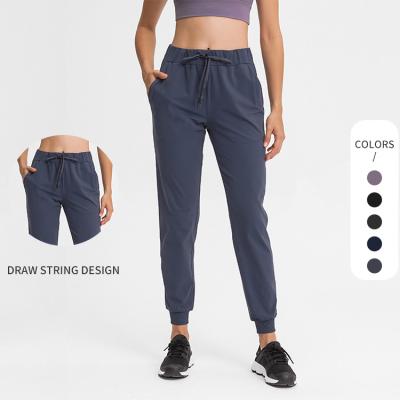 China Amazon Seller Women Workout Yoga Pants Breathable Hot Pants Fitness Friendly Sweatpants Joggers Running Sports Wear With Pockets for sale