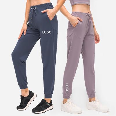 China Breathable Women Workout Yoga Pants Light Weight Casual Running Sports Wear Naked Feeling Active Joggers With Pockets Casual for sale