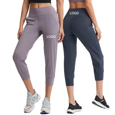 China Factory Breathable Skin Sports Yoga Pants Workout Belt Casual Fitness Friendly Quick Dry 7 Point Cropped Joggers With Pockets for sale