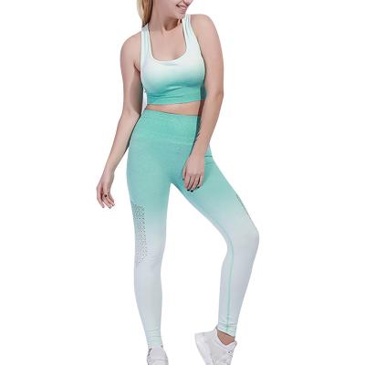 China Wholesale Breathable Gradient Color Two Piece Outfits Skinny Gaiters Sports Bra Yoga Set Gym Fitness Pants Hollow Out Outfits for sale