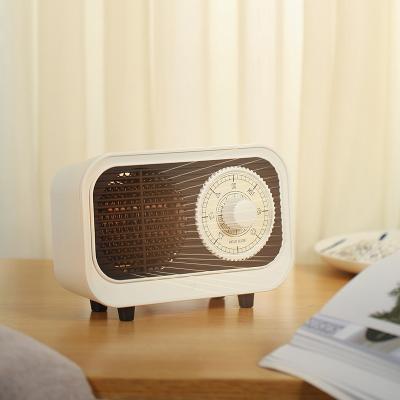 China Hotel Old School Hands Foot Heater For Ladies Desktop Small Home Warmer Use Hot Wind Air Machine PTC Ceramic Heater for sale