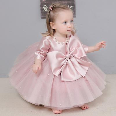 China Anti-wrinkle Baby Bow Princess Pink One Year Old Skirt Child Cute Birthday Dress Flower Children Clothing for sale