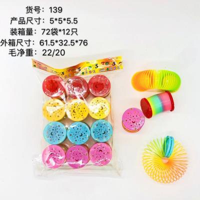 China Kids Educational Toy Hot Selling Festival Walking Colorful Plastic Folding Rainbow Spring Circle Spring Coil Magic Coil Toy for sale