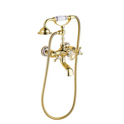 China With Luxury Slide Bar STOCCO Crystal Handle Bathtub Gold Brass Faucet With Hand Shower Phone Type Bath Faucets Sets Wall Mounted Mixer Tap for sale