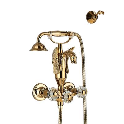 China Without Slide Bar Luxury Gold Wall Mounted Cold-Hot Brass Crystal Handshower Water Bath Shower Mixer Tap Bathroom Swan Bathtub Faucet for sale