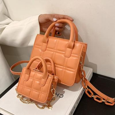 China Trendy Messenger Bags Fashion Small Square Quilted Leather Handbags Mommy And Me Solid Color Women Handbags Purses 2021 for sale