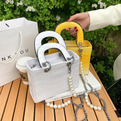 China Trendy Messenger Bags 2021 Autumn Fashion Custom Designer Hand Bags Ladies Stretching Bolsas Pearl Chain Bag Stone Pattern Luxury Tote Handbags For Women for sale