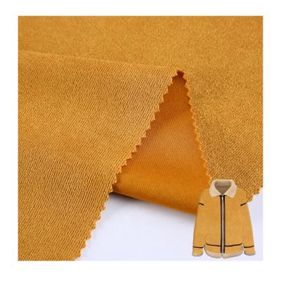 China 2022 New Arrival Anti-Static Hot Sale Wholesale Polyester Spandex Knit Solid Micro Suede Fabric For Coat for sale