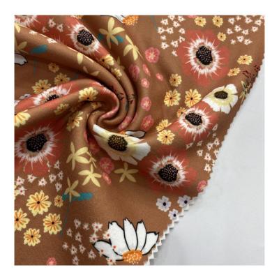 China Viable New Arrival Hot Sale Wholesale Brown Flowers Digital Printing Brushed Dralon Fabric For Garments for sale