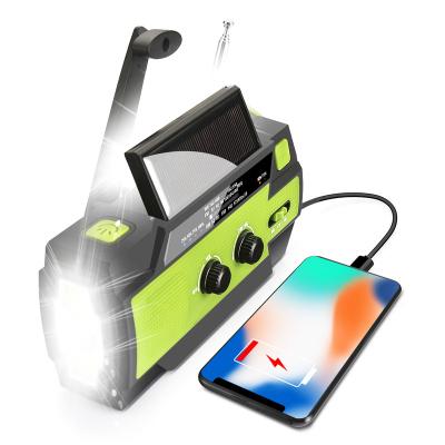 China LED emergency hand crank solar power smart phone charger with solar panel radio charger solar powerbank 4000mah for sale