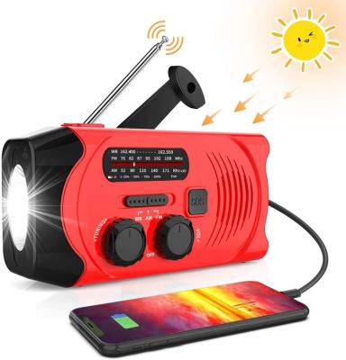 China Hot sale PORTABLE emergency solar hand crank led flashlight portable noaa am fm weather radio for sale