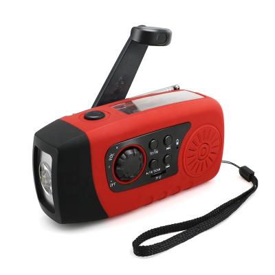 China PORTABLE Multi Functional Emergency Solar Hand Crank FM Radio With Flashlight for sale