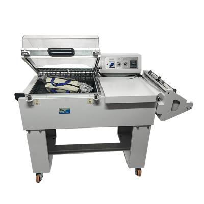 China Commodity FM5540 Two-in-one heat shrink packaging machine, shrink film packaging machine, plastic shrink wrap machine for sale