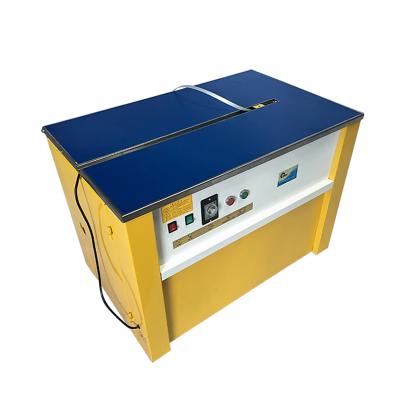 China Semi-automatic food strapping machine, garment carton packer, pp belt packer for sale