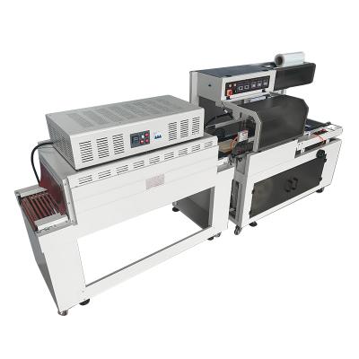 China Fully Automatic Food Film Covering, Sealing, Cutting and Heat Shrink Packaging Machine Combination for sale