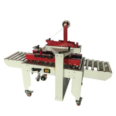 China FXJ-4030 Semi Automatic Left And Right Food Drive Belt Adhesive Tape Sealer Crate Box Carton Sealing Machine for sale