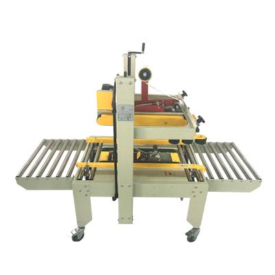 China FXJ-6050 feed through drive sealer, automatic band sealer, carton sealer for sale