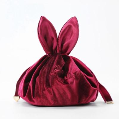 China QJMAX fashion ins net wind cosmetic bags high quality red lazy red makeup portable handbag velvet bag for sale