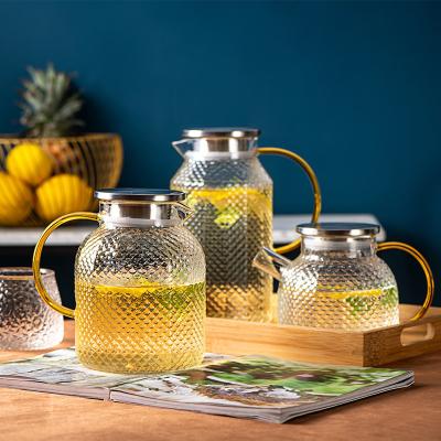 China Sustainable Promotion High borosilicate water jug glass set with stainless steel lid for sale