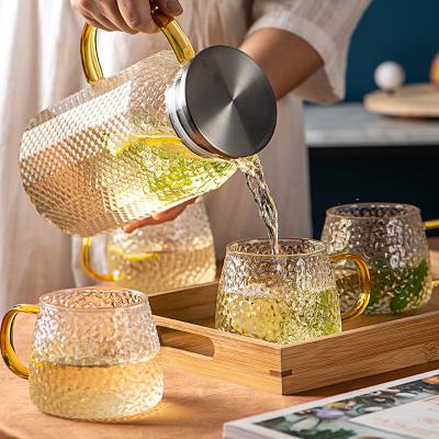 China Sustainable Hot selling1800ml Transparent Large volume glass water jug With flower pattern for sale