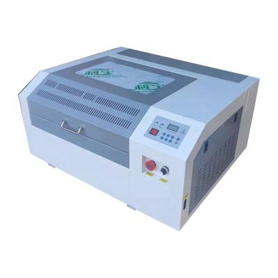 China - laser engraving machine low price wood laser paper engraving machine for sale