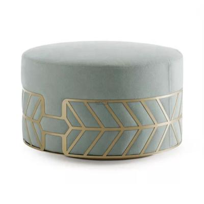 China Contemporary Modern Hollow Carved Design Stainless Steel Velvet Belte Pouf Stool for sale