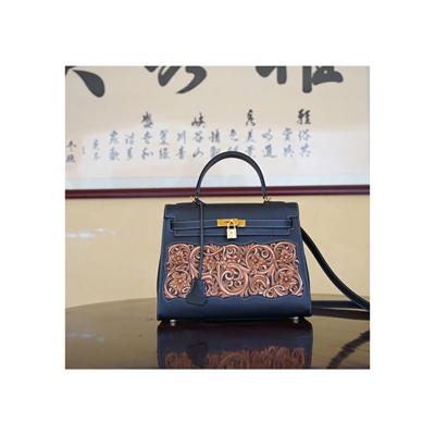 China Exquisite and Elegant Hand Cut Pattern Women Women Shoulder Bags Luxury Durable Leather Tote Bag For Sale for sale