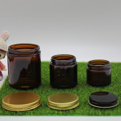 China Hot Sale Customized Label Recycled Amber Perfume Candle Jars Scented Empty Candle Glass Jars With Lids For Candle Making for sale