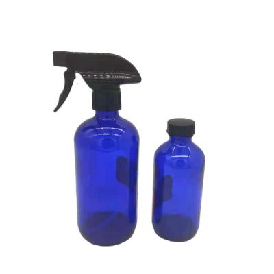 China Personal Care 16oz 480ml Boston Blue Glass Bottle With Trigger Sprayer For Flower Watering for sale