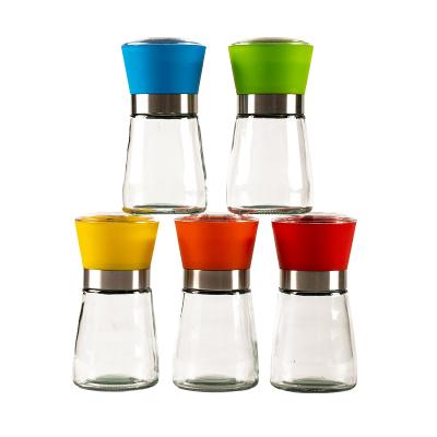 China Household Products 100ml Cone Shape Salt Grinder Modern Glass Bottle Mini Spice Bottle With Red Cap for sale