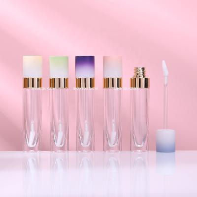 China Cosmetic wholesales single purple pink plastic clear empty tube containers liquid lipstick cylinder cover lip gloss tube for sale