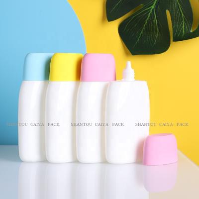 China Fashionable Unique Flat Shape 50ML Flat Shape Lotion Bottle Sunscreen Body Lotion Hand Cream PP Plastic Refillable Squeeze Bottle for sale