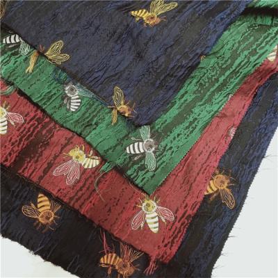 China Custom Memory Bee Animal 100%Polyester Yarn-dyed Jacquard Fabric For Jacket Coat Suit Garment for sale