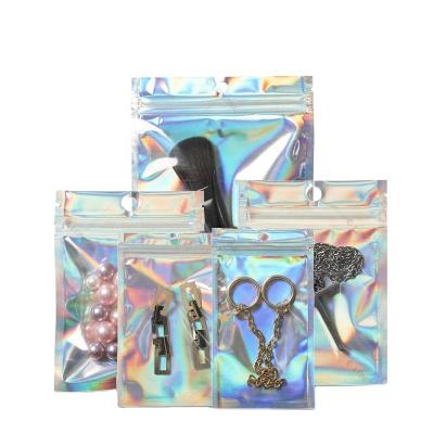 China Longine 90 Plastic Packaging Mylar Hologram Resealable Bag Smell Proof Printing Custom Transparent Top Zipper Food Moisture Proof Small for sale