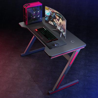 China Simple Modern Led Light Modern Desk Z Shaped RGB Multi Colors Stretching Table Gaming Computer Desk Table for sale