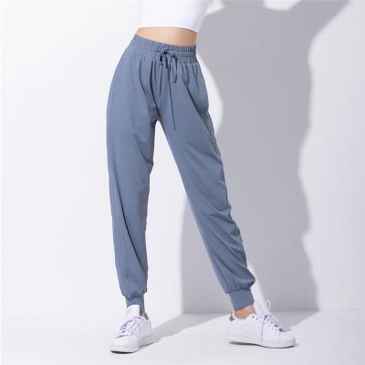 China New Breathable Loose High-waisted Pants With Tied Feet Yoga Pants Women's Stretch Sports Jogging Pants for sale