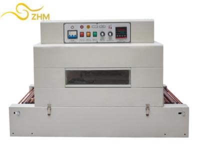 China Food Food Shrink Wrapping Machine Carton Box Heat Shrink Packing Tunnel Wrapping Machine for sale