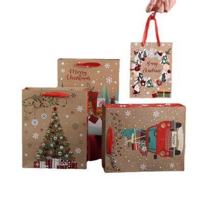 China Wholesale Recyclable Christmas Kraft Paper Gift Bag For Christmas Party Brown Bolsa De Navidad Decorative Paper Bags for sale