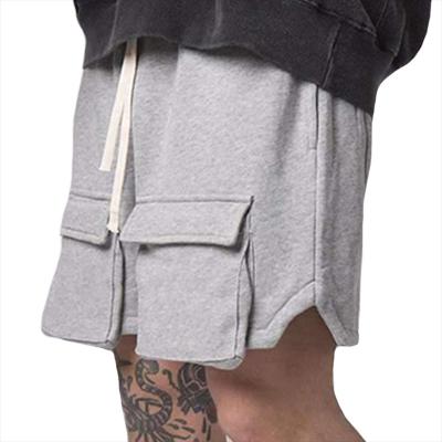 China Custom Logo Summer Big Pocket Design Anti-Wrinkle Simple Dye Half Shorts Boardshorts Sports Cotton Men's Casual Oversized Basketball Shorts for sale