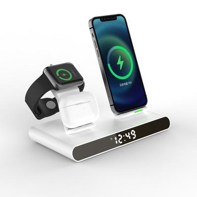 China Mobile phone alarm clock stand dock 4 in 1 multifunction watch fast wireless charging station for sale