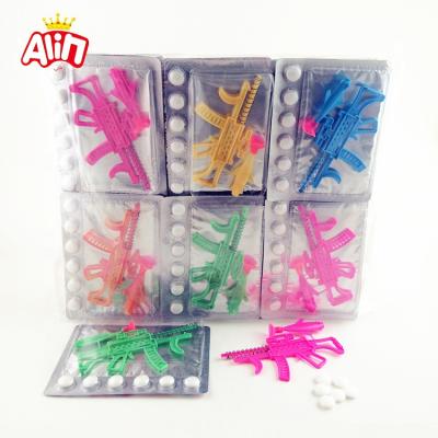 China Cartoon Toys Wholesale Assemble Toy Guns With Sweet And Sour Fragile Skin Candy for sale