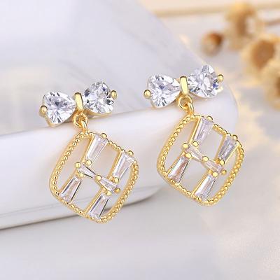 China FASHIONABLE Gold Plated Bow Earrings Letter H Cubic Zircon Sterling Silver Needle Earrings for sale