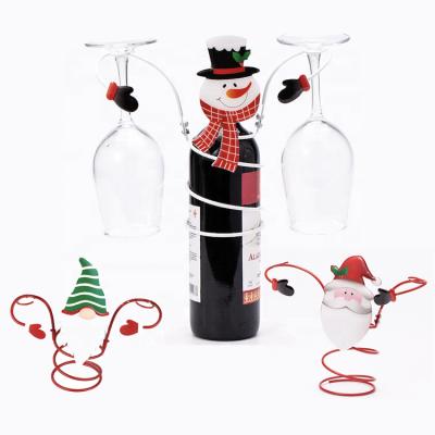 China Santa Claus Snowman Iron Rack Christmas Wine Glass Viable Rack For Bottle Goblet for sale