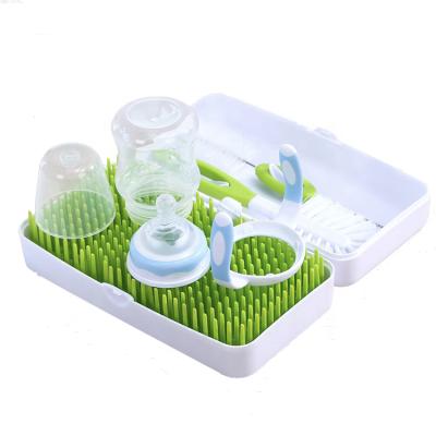 China BPA Free Countertop Storage Green Lawn Grass Portable Boxed Baby Bottle Drying Rack for sale